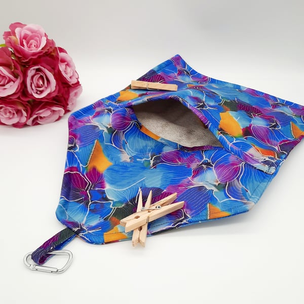 Blue and purple floral clip on peg bag. 