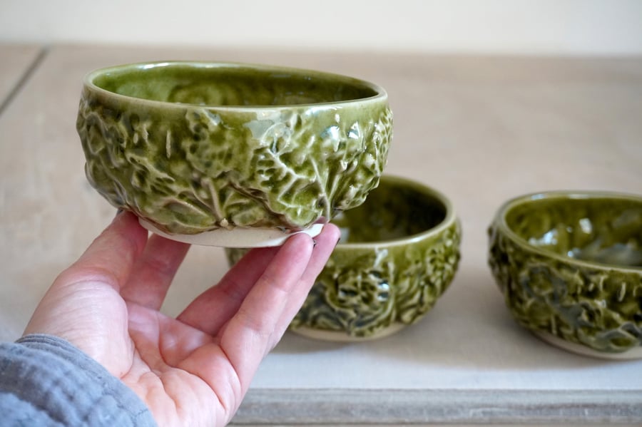 One small stoneware cabbage bowl, snack bowl glazed in green