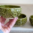 One small stoneware cabbage bowl, snack bowl glazed in green