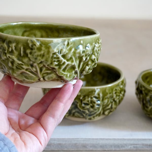 One small stoneware cabbage bowl, snack bowl glazed in green