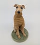 Whippet in Ochre Woolly Jumper Ceramic Sculpture