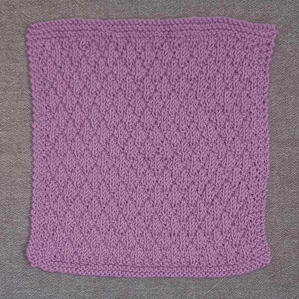 Pink hand knitted dishcloth 100% cotton