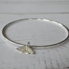 Hammered recycled sterling silver bangle with mini moth charm