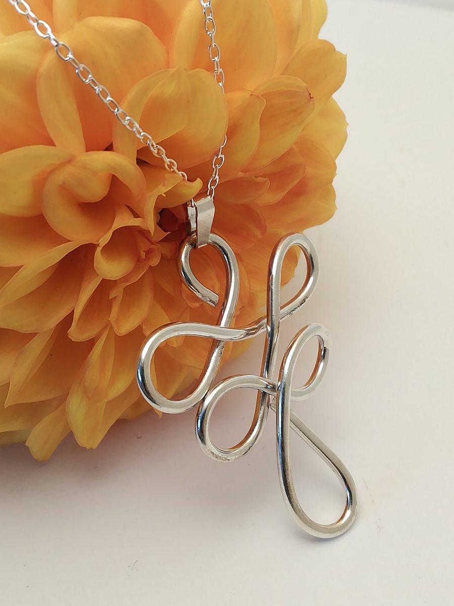 sterling silver elegant abstract curved pendant