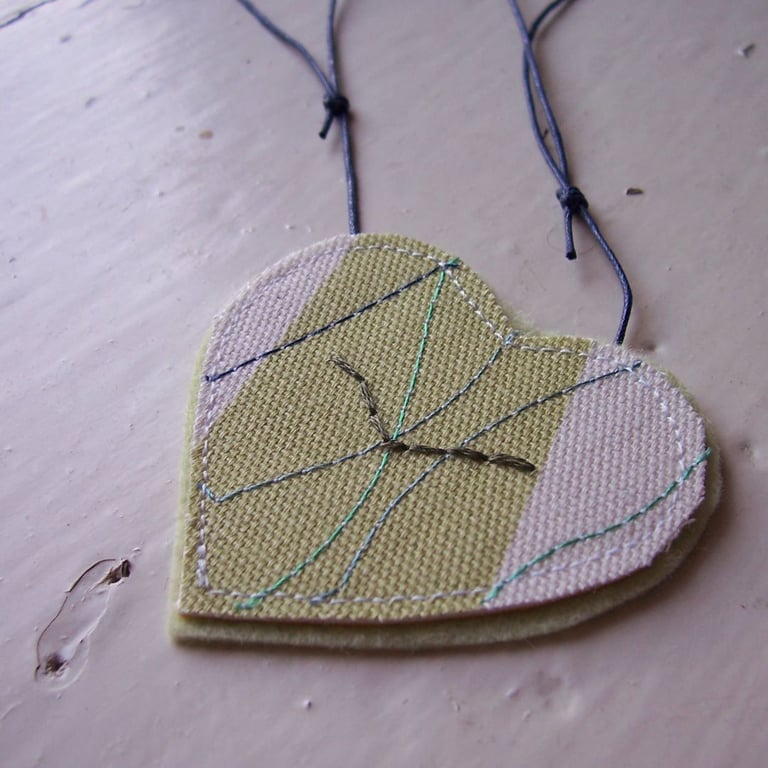 Ocean bird, heart shaped, hand and machine embroidered necklace