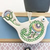 Ceramic bird decoration with patterned wing and tail 