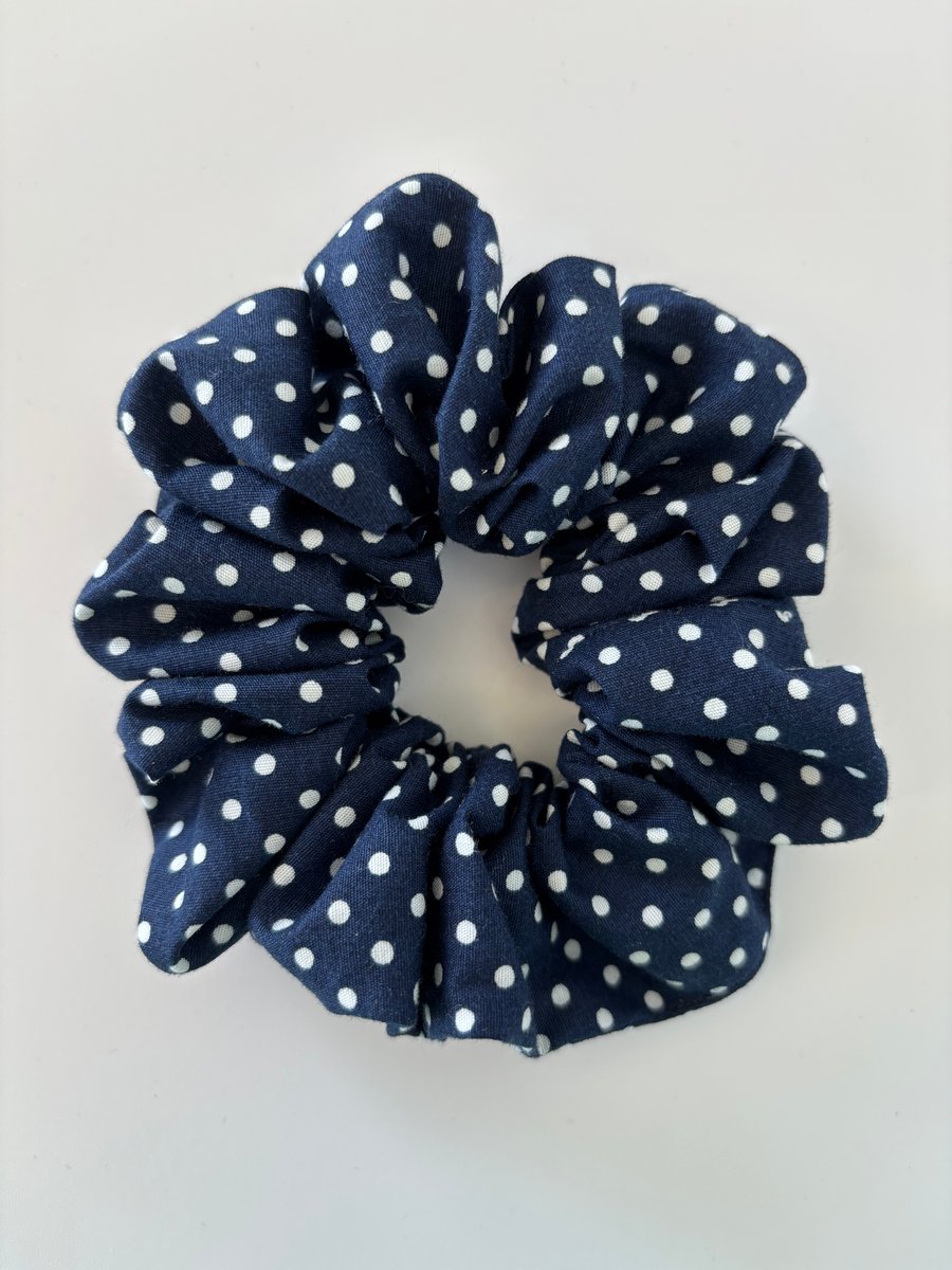 Cotton scrunchie hair accessory in navy and white spot design