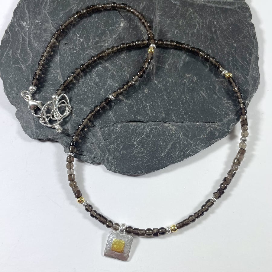 Silver 18ct gold and smokey quartz necklace