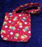 Red Fabric Bag with Colourful Playful Elephants - Image 1