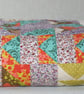 Multi-coloured puzzle quilt - Image 1