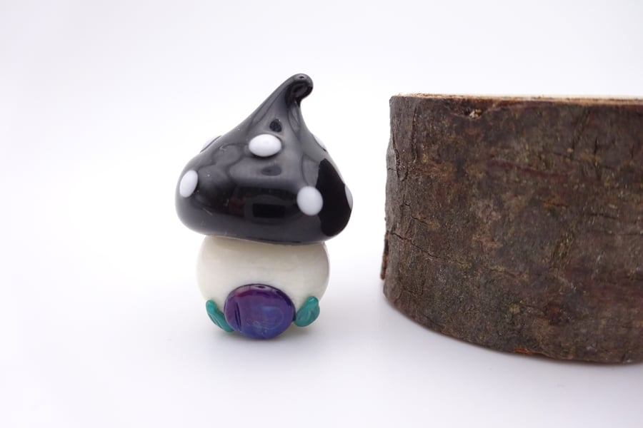 small glass toadstool house