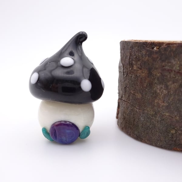 small glass toadstool house