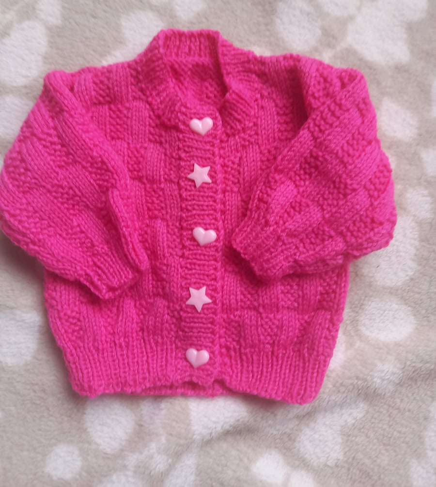 Hand knitted pink baby girls cardigan