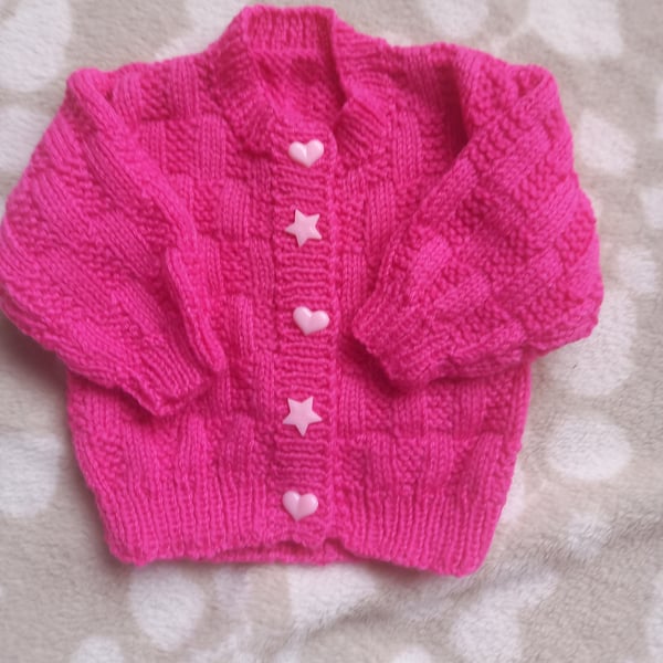 Hand knitted pink baby girls cardigan