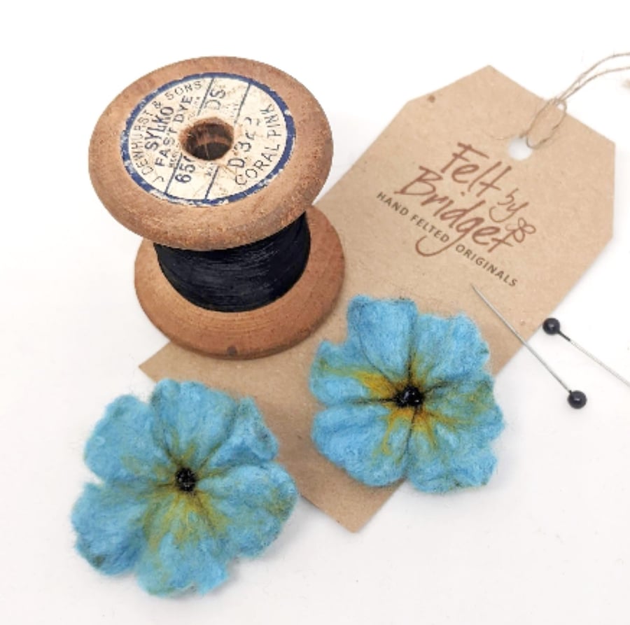 Small light bright blue felted flower brooch