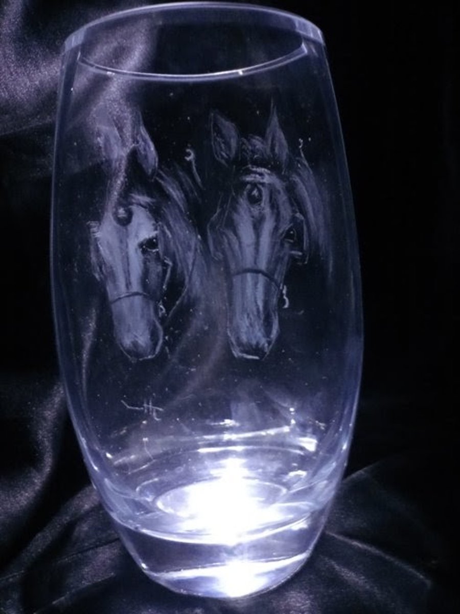 Horses on a stemless wineglass