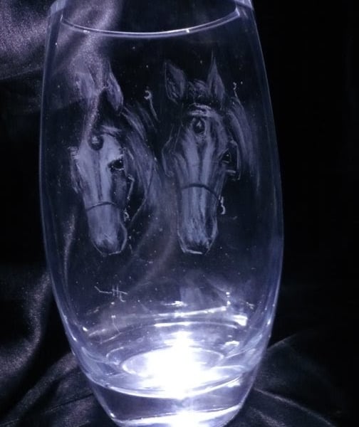 Horses on a stemless wineglass