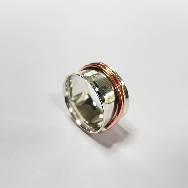 Silver and copper spinner ring