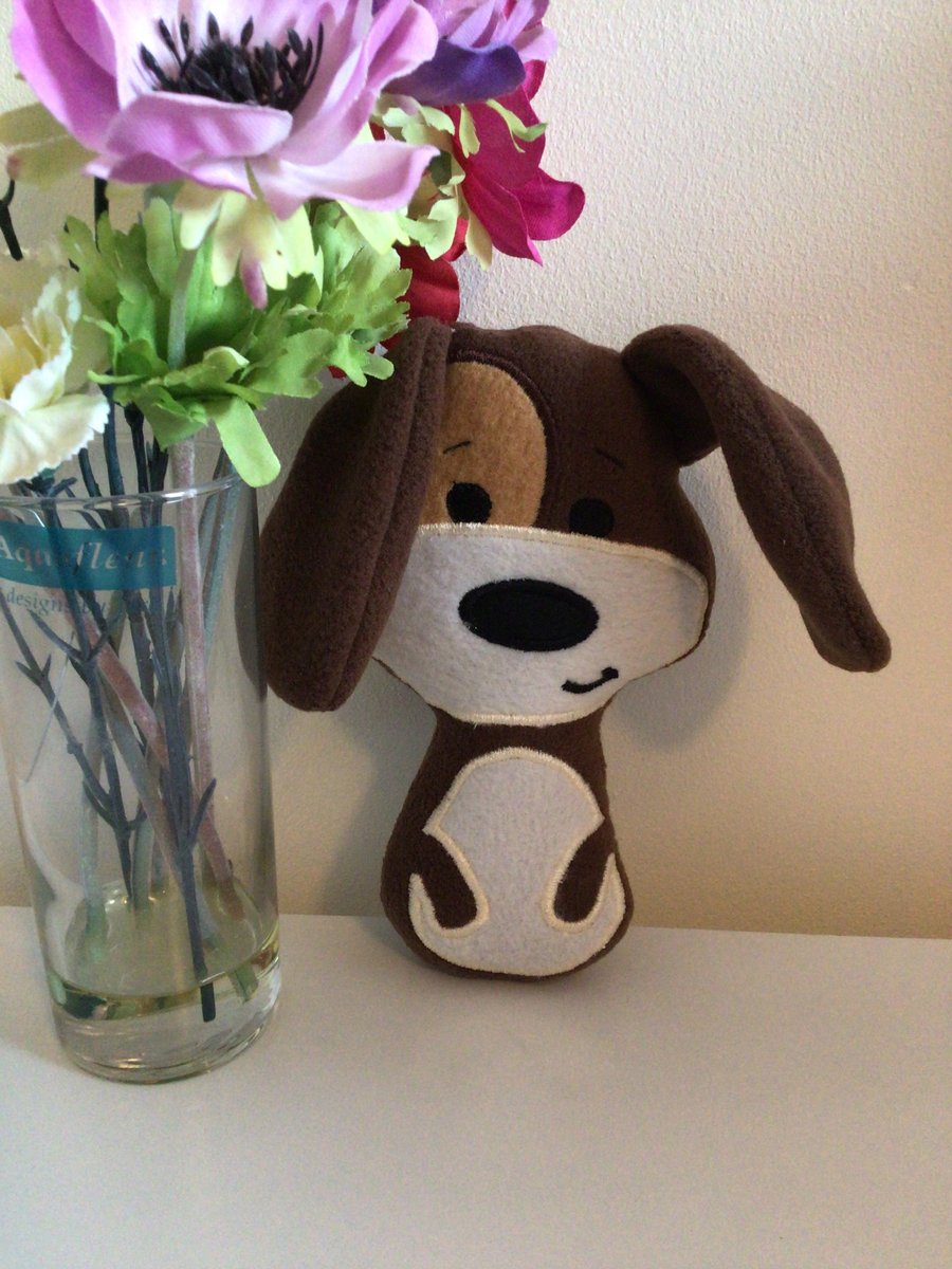 Dog softie toy in brown.