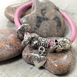 Pink Leather bracelet with elephant, heart and Celtic knot beads 