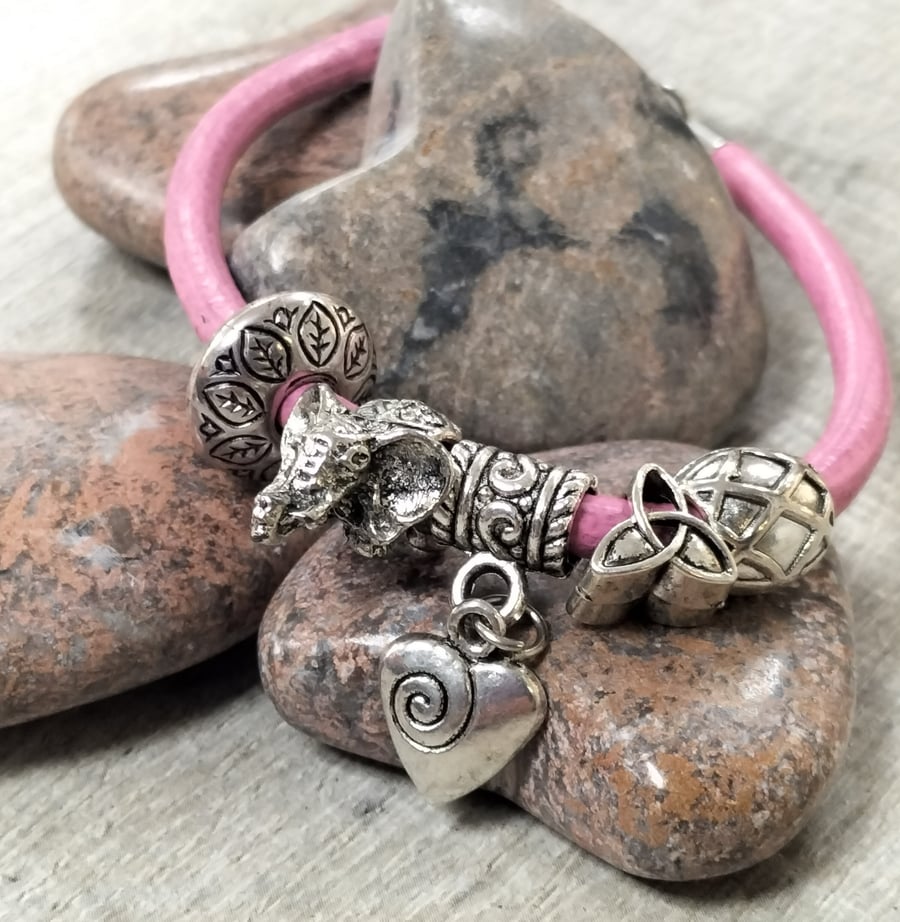Pink Leather bracelet with elephant, heart and Celtic knot beads 