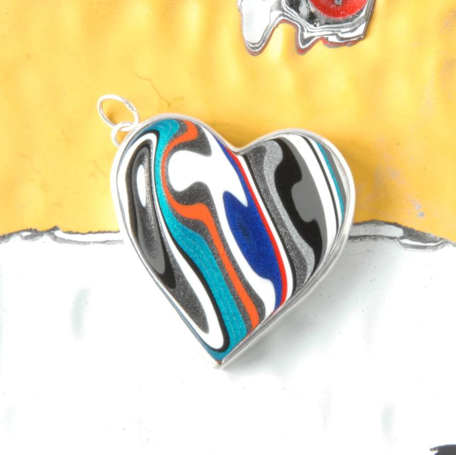 Teal and grey heart shaped fordite pendant