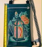 Embroidered Lantern Crossbody Bag – Dark Teal Vinyl – Floral & Web Design  - Image 3
