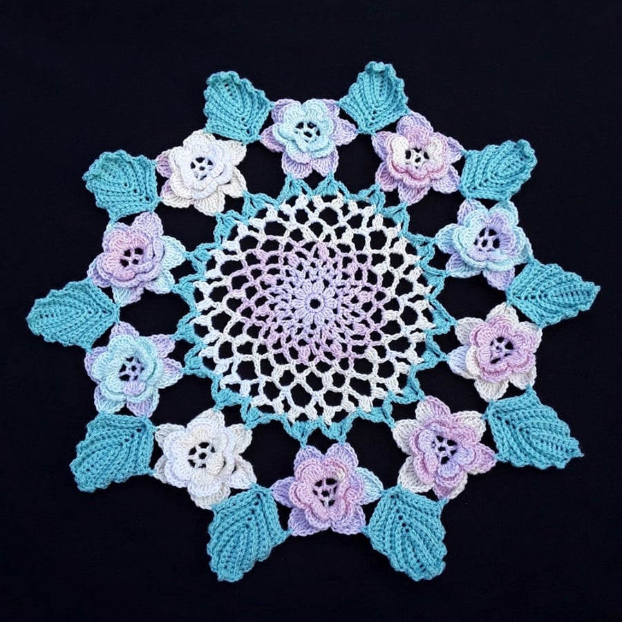 Vintage pastel coloured crocheted doily from a 1940's vintage pattern