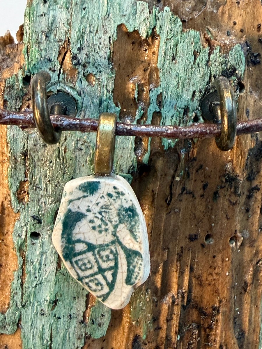 Green sea pottery pendant