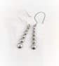 Silver pebbles drop earrings - Image 3
