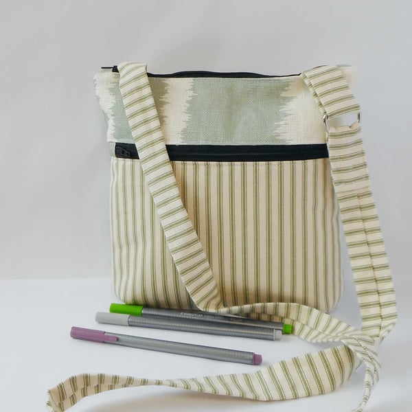 Striped cotton and linen fabric crossbody bag with zipped pocket 