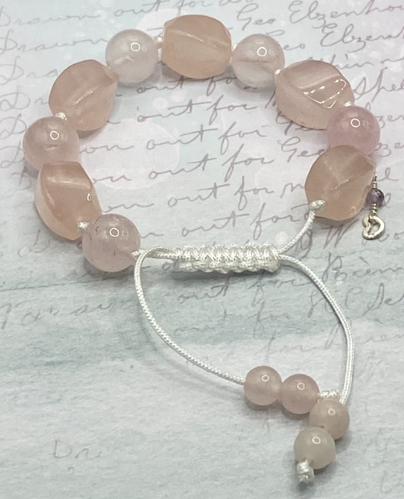 Knotted white macrame cord bracelet with rose quartz nuggets