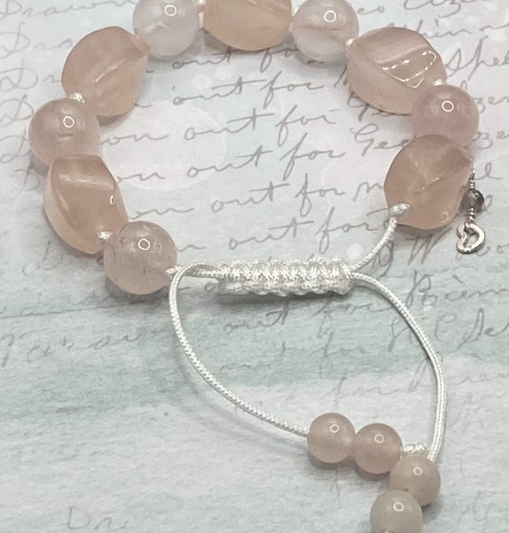 Knotted white macrame cord bracelet with rose quartz nuggets