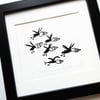 Six Puffins in Flight - lino cut print