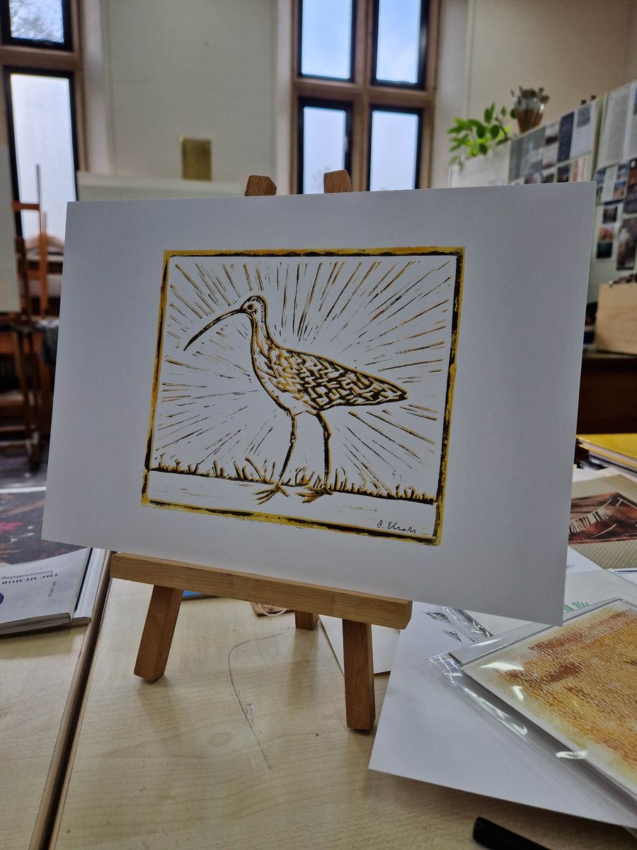 Curlew lino print. A4 hand printed. Yellow ochre and black ink.