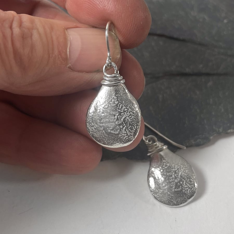 Sterling silver pear drop earrings with wire wrapped tops