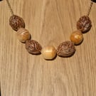 Nectarine Kernels and Bay tree bead necklace.