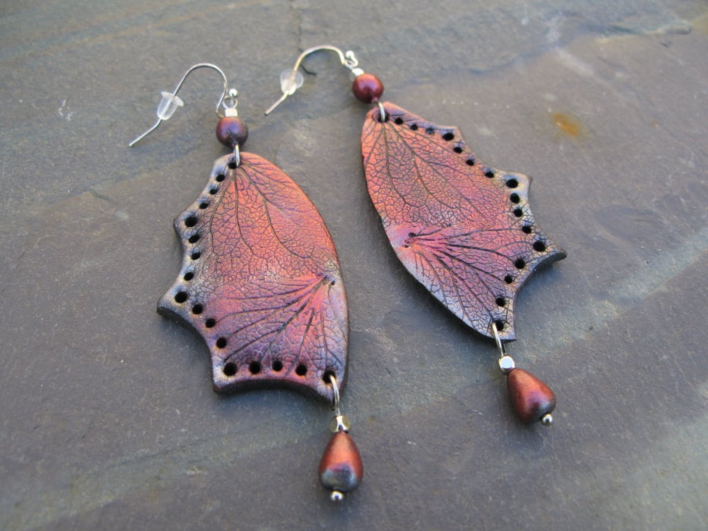 Draig Goch - hand crafted polymer clay earrings in the form of red dragon wings.