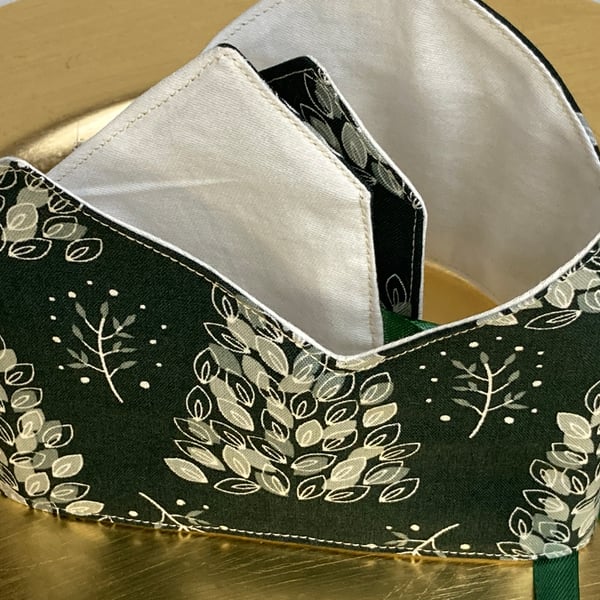 Pick and Mix Reusable Christmas Crown. Dark green with snowy trees.