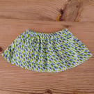 Baby skirt handmade in a blue and green patterned fabric age 6-9 months