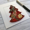 Embroidered up-cycled fabric Christmas card and decoration. 