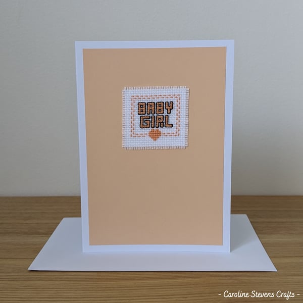 Baby girl heart card – Pastel orange cross stitch