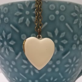 Ivory Enamel Heart Locket....