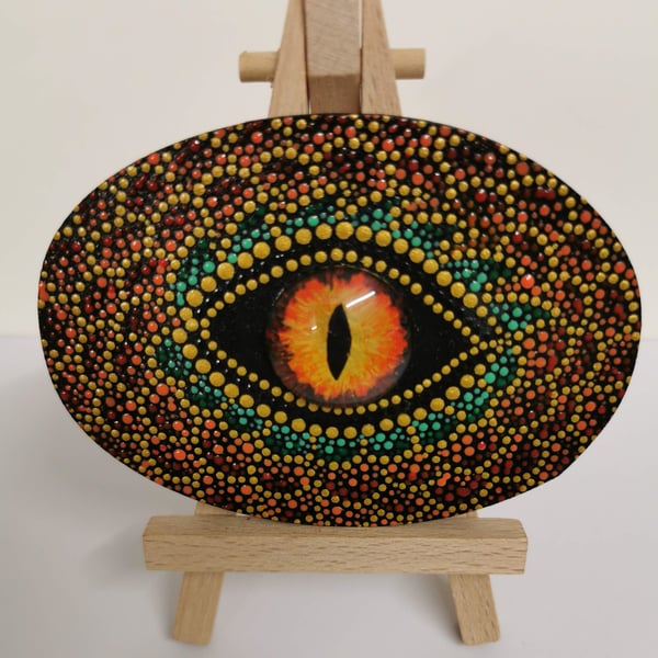 Hand painted orange 'dragon's eye' mandala decorative piece