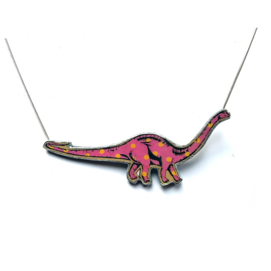 Amazing statement pink spotty Diplodocus dinosaur Resin Necklace by EllyMental
