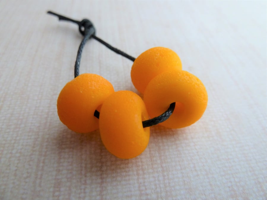 orange tumbled lampwork glass beads