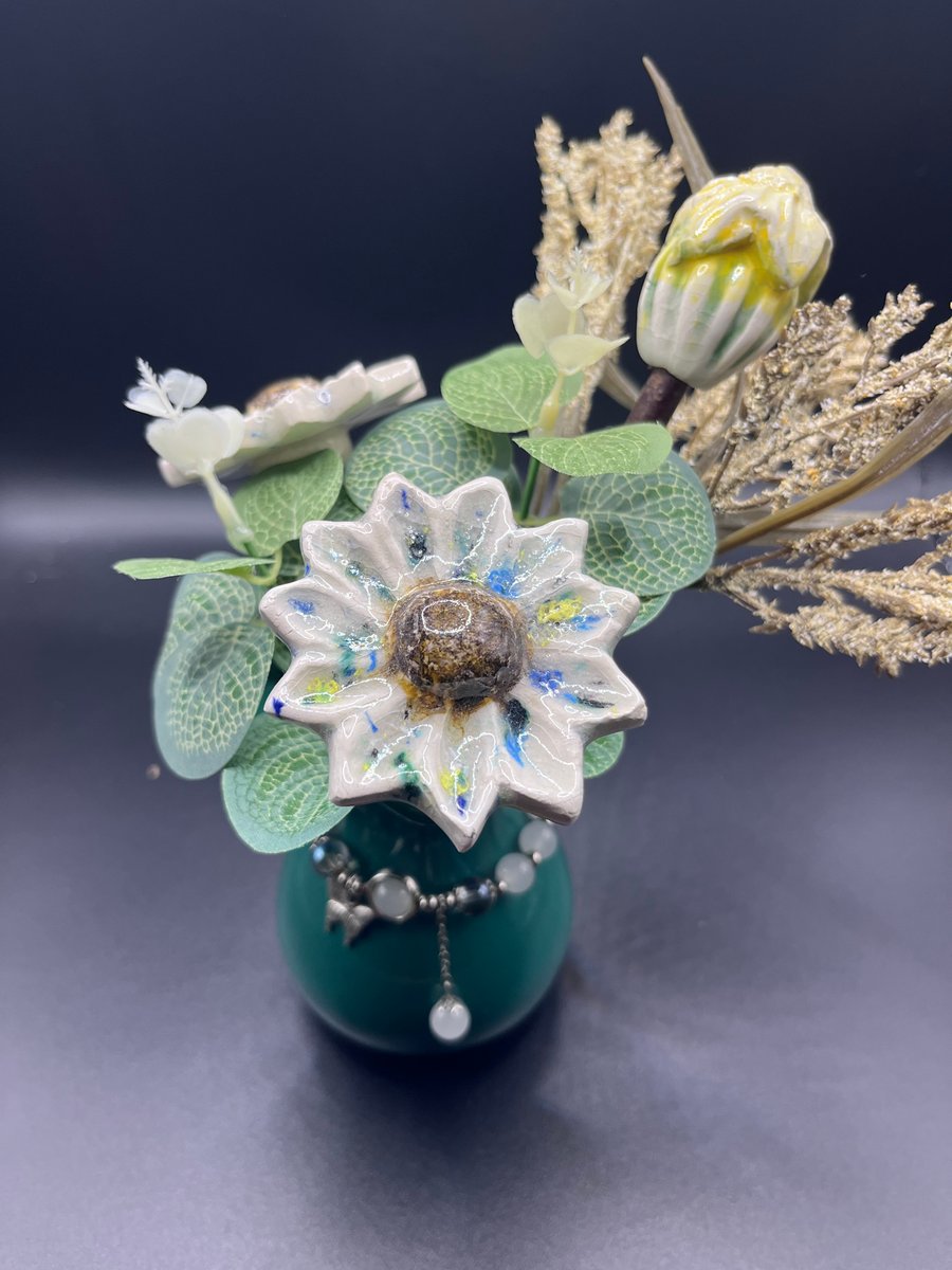 Vase of ceramic flowers 