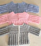 Newborn cardigans or jackets in three different colours 