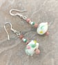 Dangle earrings with lampwork beads, white, pink and green, plus silver hooks - Image 1