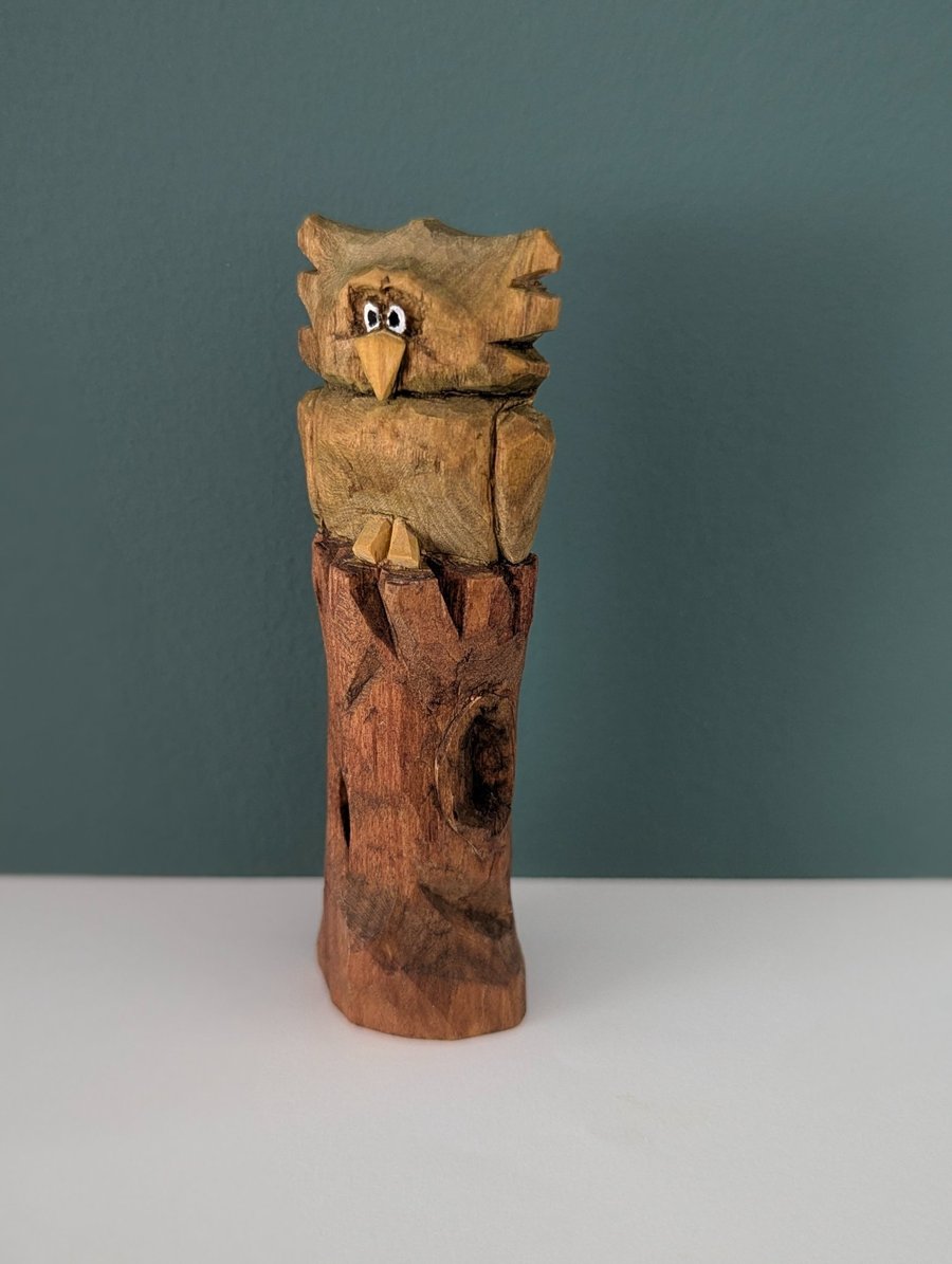 Hand Carved Owl on a Trunk